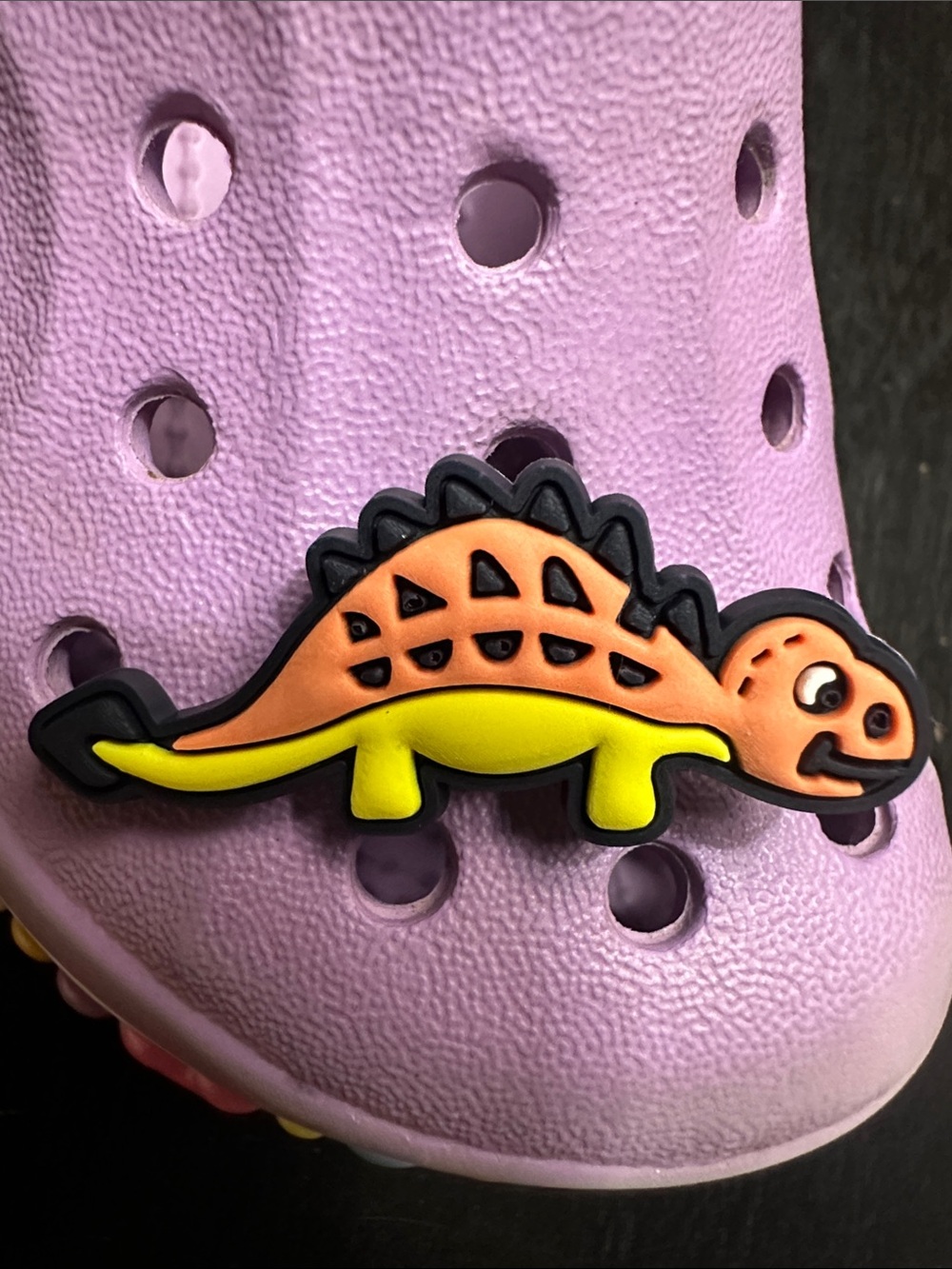 Jibbitz Orange & Yellow Stegosaurus Reptile Shoe Charm